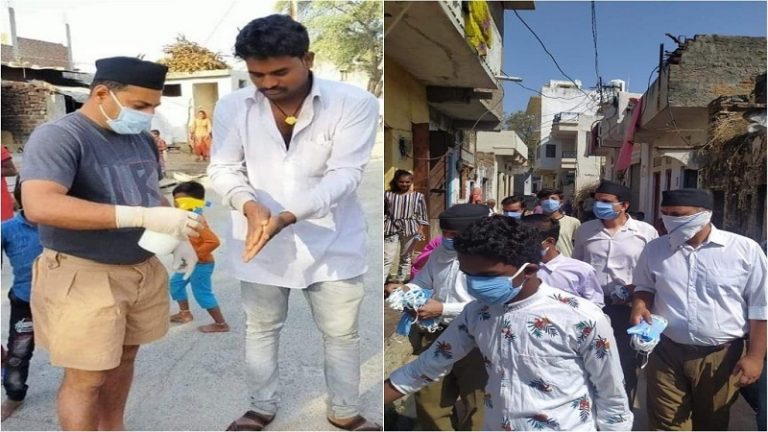 कोरोना संकट के समय गाँव की गलियों, अस्पतालों को सेनेटाईज करने में जुटे संघ के स्वयंसेवक, मास्क देकर लोगों को कर रहे जागरूक