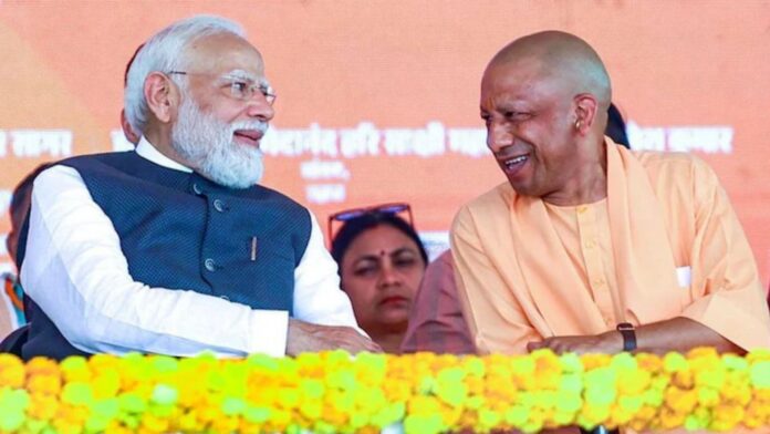 प्रधानमंत्री मोदी के साथ CM योगी (फोटो साभार: NDTV)